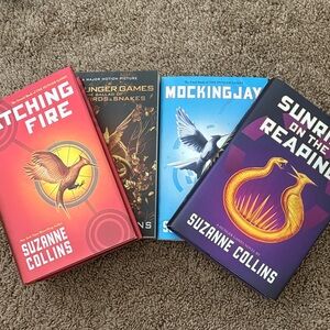 Catching Fire by Suzanne Collins - Red & Orange Hardcover